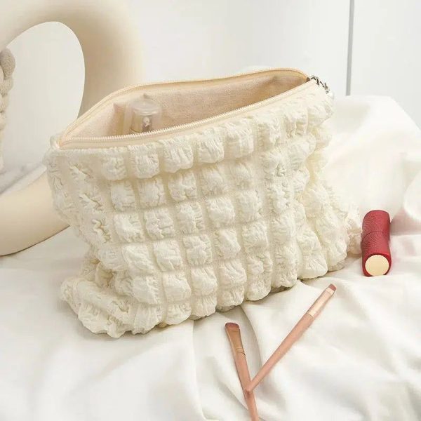 trousse de toilette beige matelassée femme