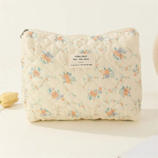 trousse de toilette blanche fleurs matelassée femme