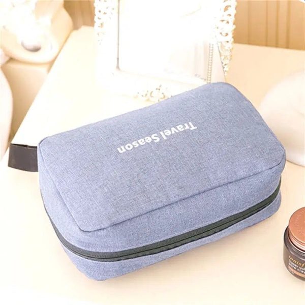 trousse de toilette grise à suspendre voyage homme