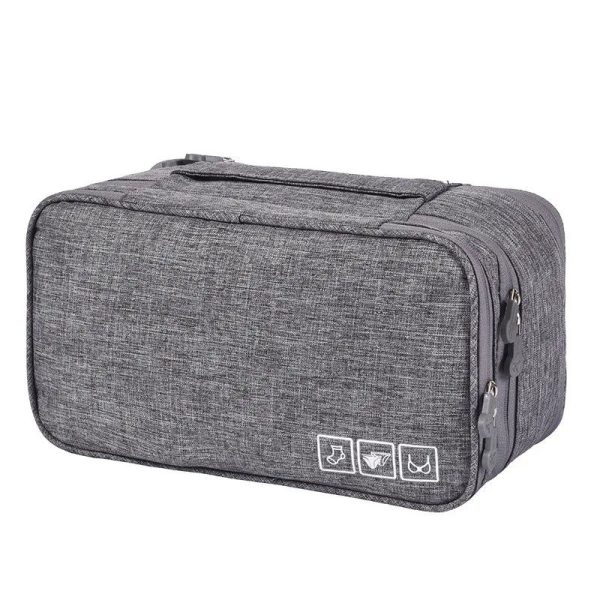 trousse de toilette grise avec compartiment femme