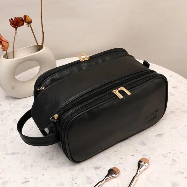 trousse de toilette noire en cuir tendance femme