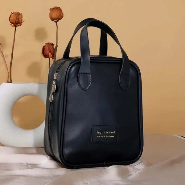 trousse de toilette noire en cuir voyage femme