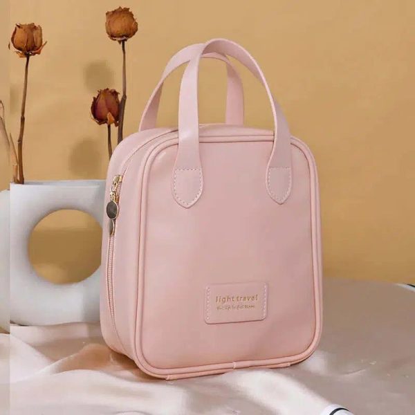 trousse de toilette rose en cuir femme