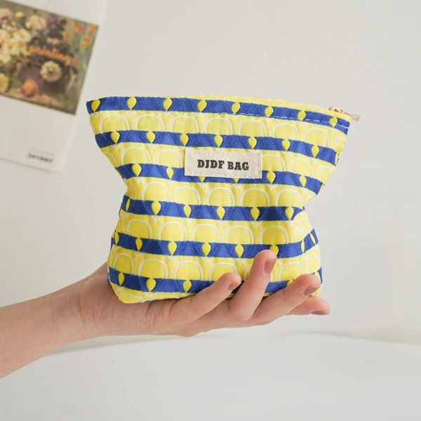 petite trousse de maquillage motifs plumes de paon