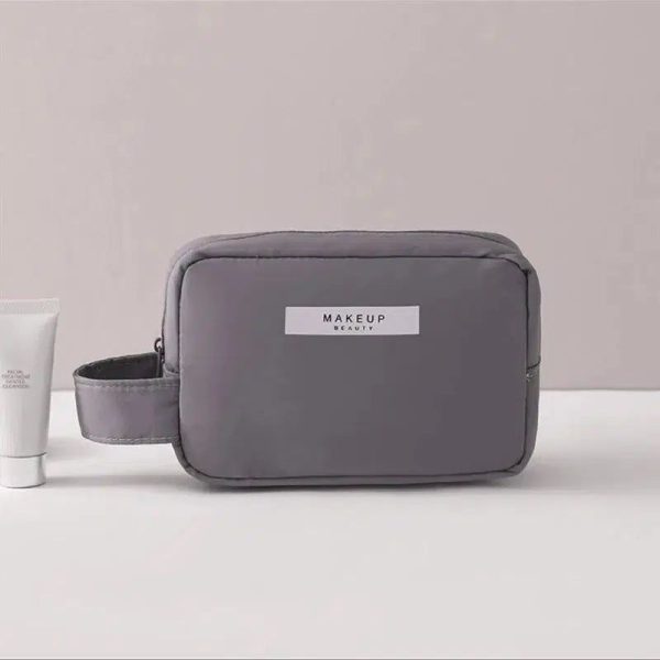 trousse de toilette grise tendance femme