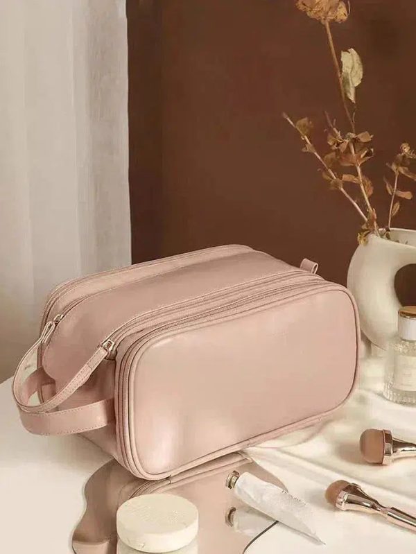 trousse de toilette rose en cuir